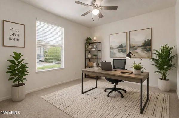 a workspace with furniture and a potted plant
