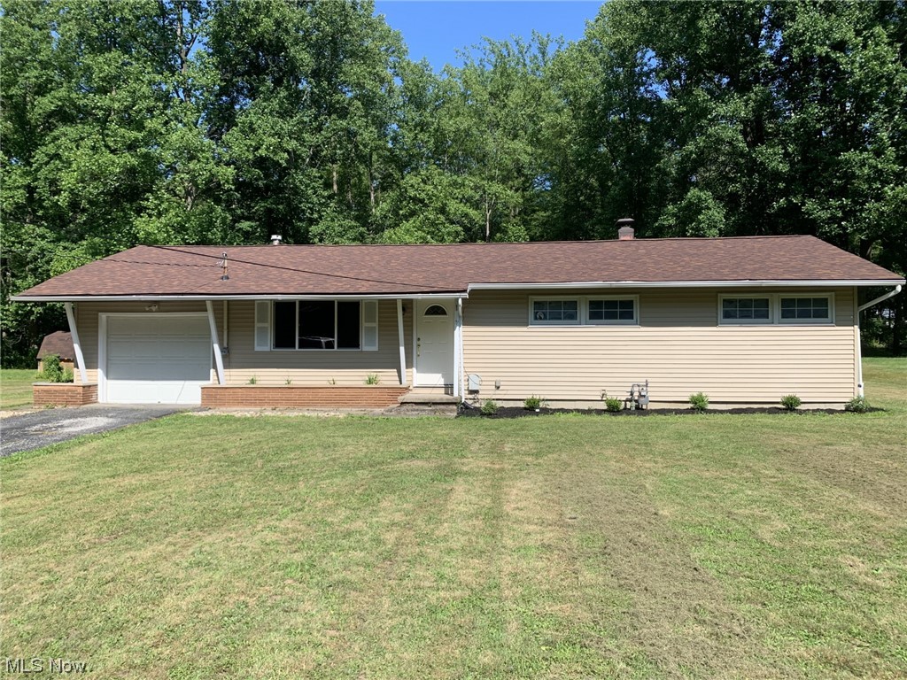 7618 Poore Road Conneaut, OH 44030 - Photo 1 of 18 Ranch-style house with a front lawn