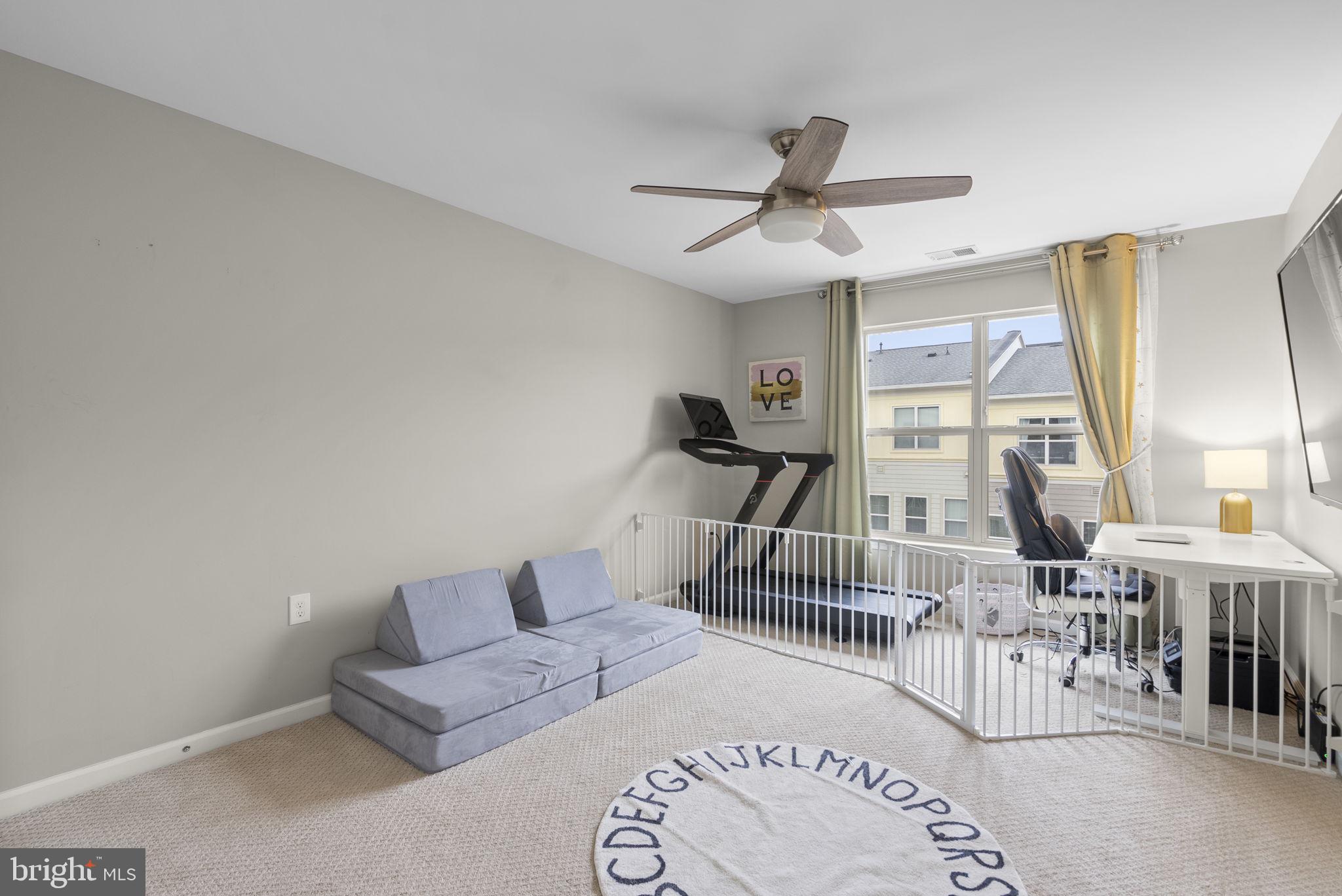 121 Copley Circle, Unit 34B Gaithersburg, MD 20878 - Photo 33 of 43 a living room with furniture