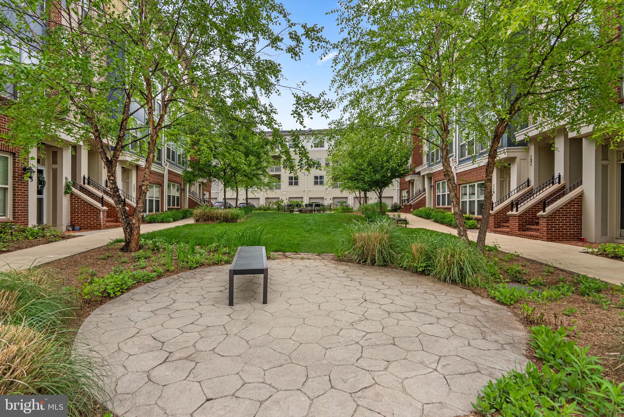 121 Copley Circle, Unit 34B Gaithersburg, MD 20878 - Photo 41 of 43 a view of a park with large trees