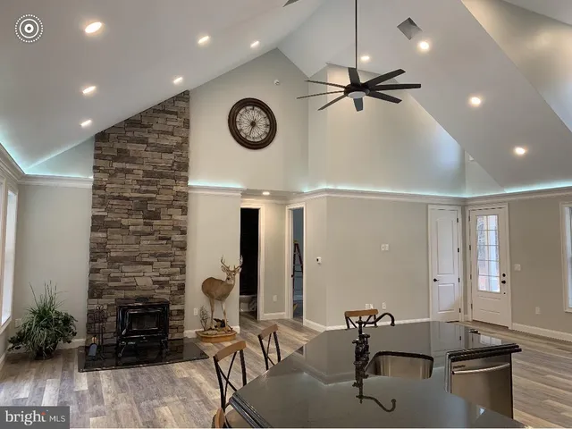 a very nice looking dining room with a table and chairs