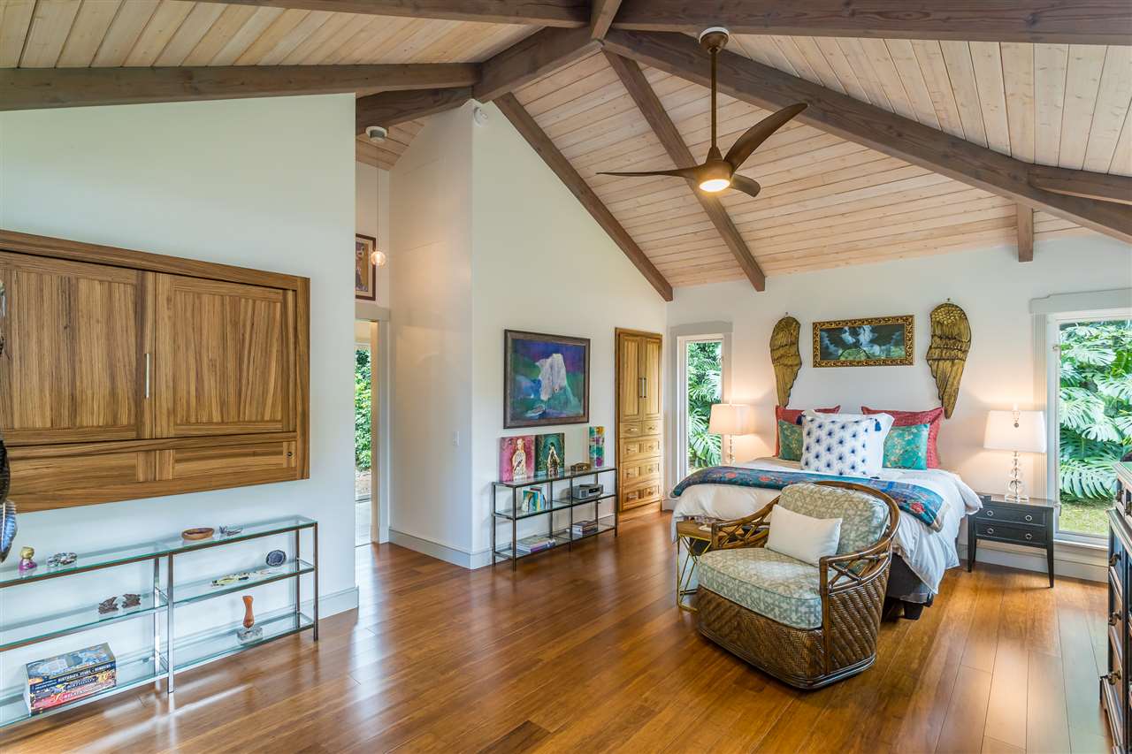 2425 Lilikoi Road Haiku, HI 96708 - Photo 14 of 30 a bedroom with furniture and wooden floor