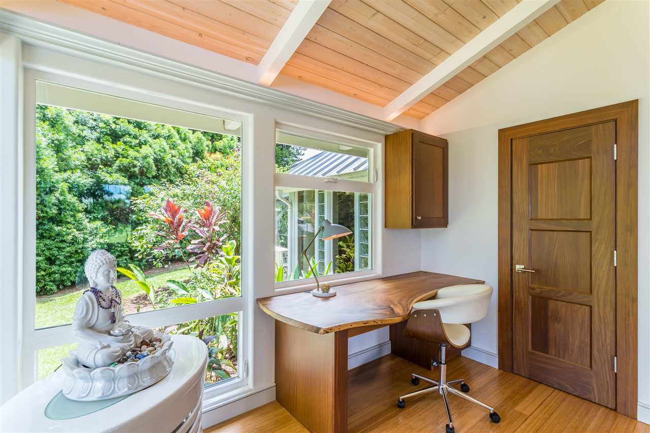 2425 Lilikoi Road Haiku, HI 96708 - Photo 5 of 30 a view of a dining room with furniture window and wooden floor