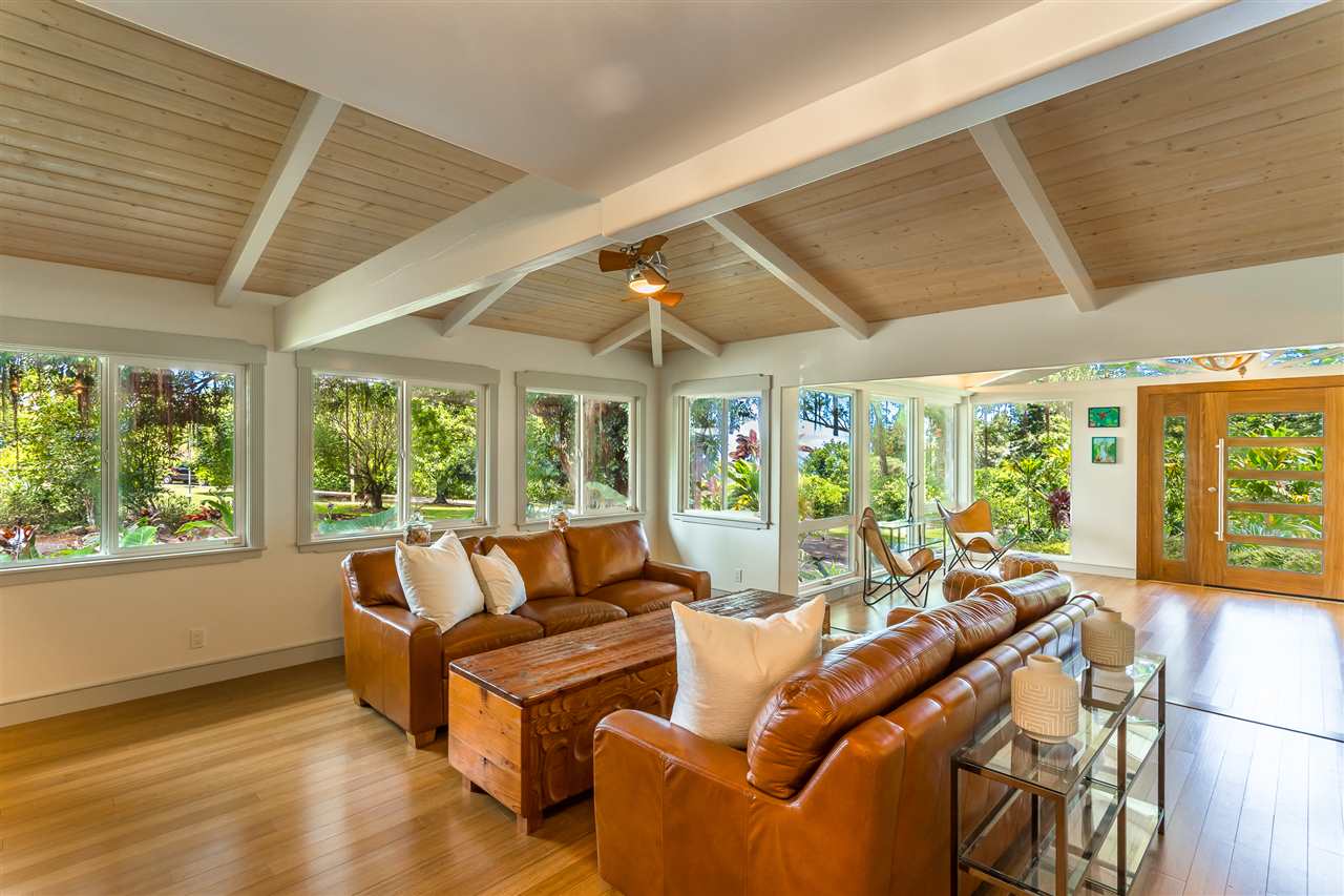 2425 Lilikoi Road Haiku, HI 96708 - Photo 7 of 30 a living room with furniture and a large window