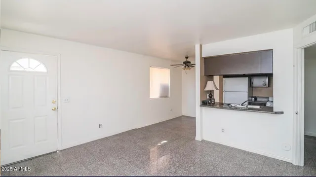 a view of a kitchen with a sink