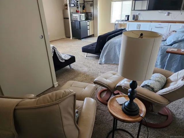a living room with furniture and a couch