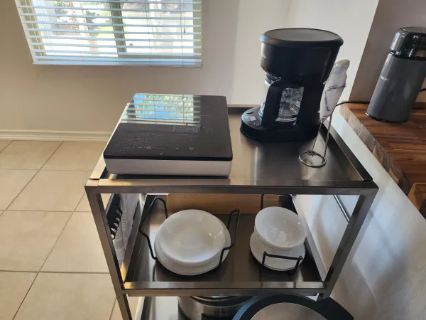 a view of living room with furniture and a window