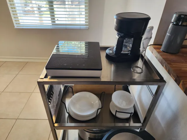 a view of living room with furniture and a window