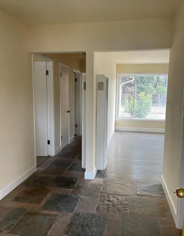 a bathroom with a sink a mirror and vanity