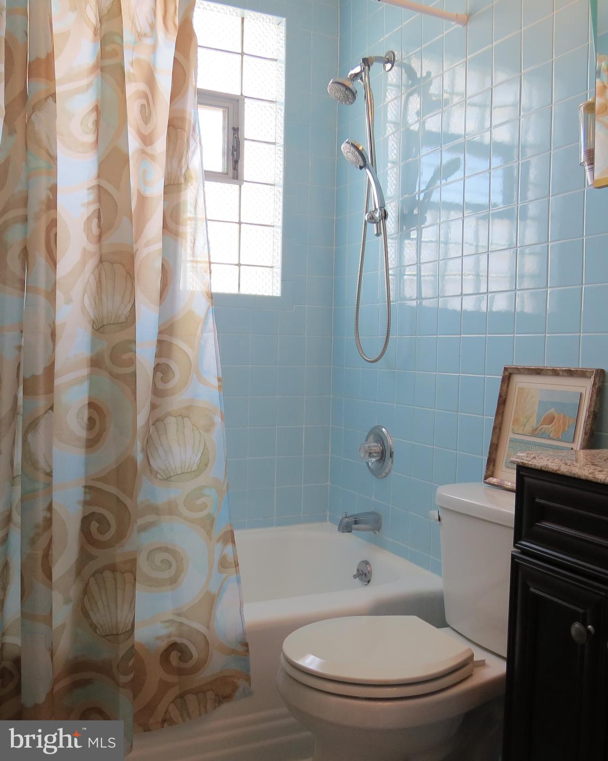 Updated bath with ceramic tile