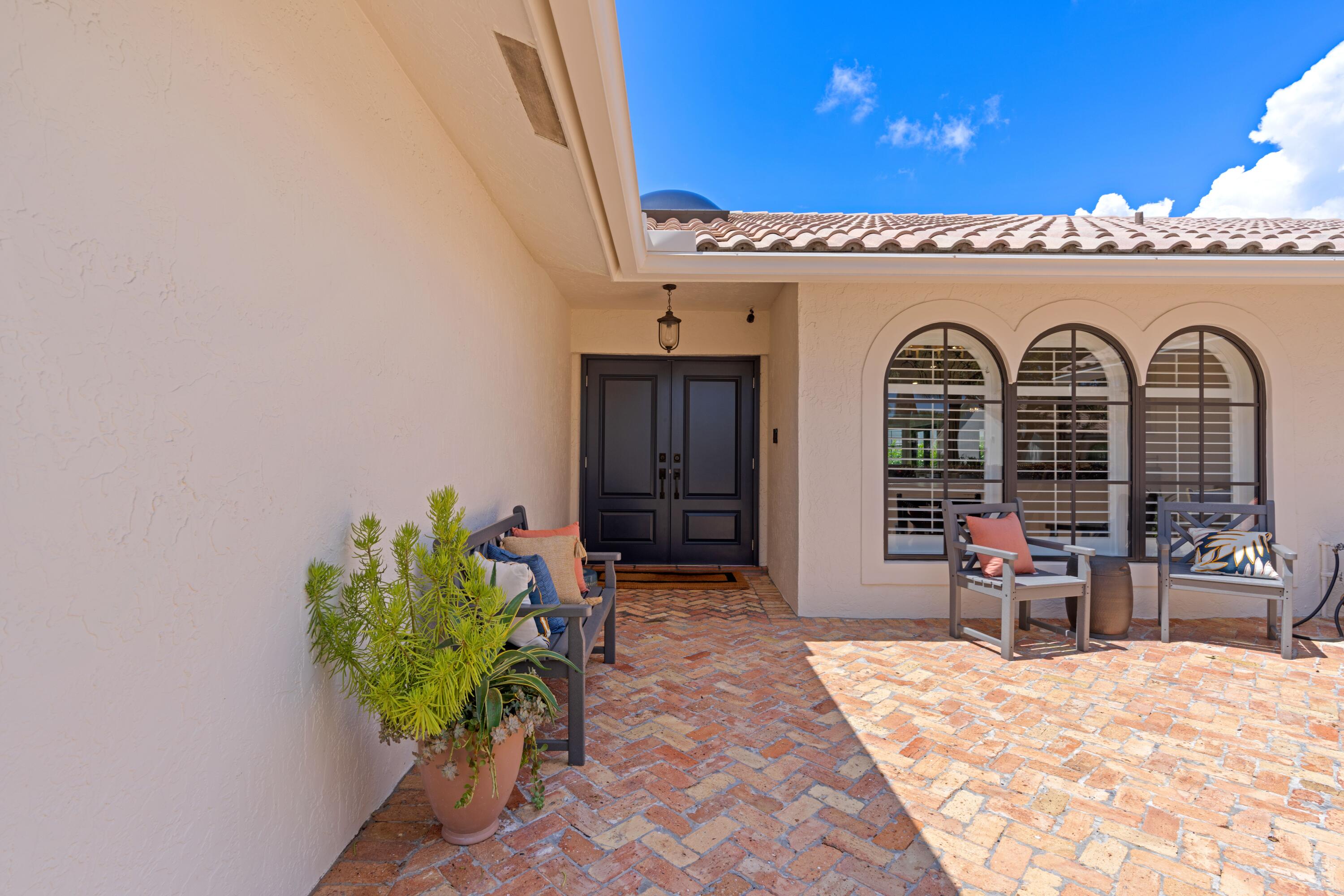 2721 Northwest 28th Terrace Boca Raton, FL 33434 - Photo 4 of 41 FrontPatio2