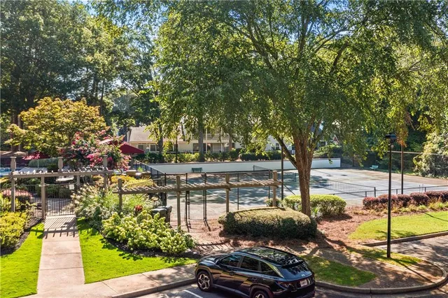 a view of a swimming pool with a patio