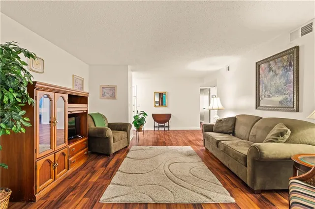 a living room with furniture or couch and a fireplace
