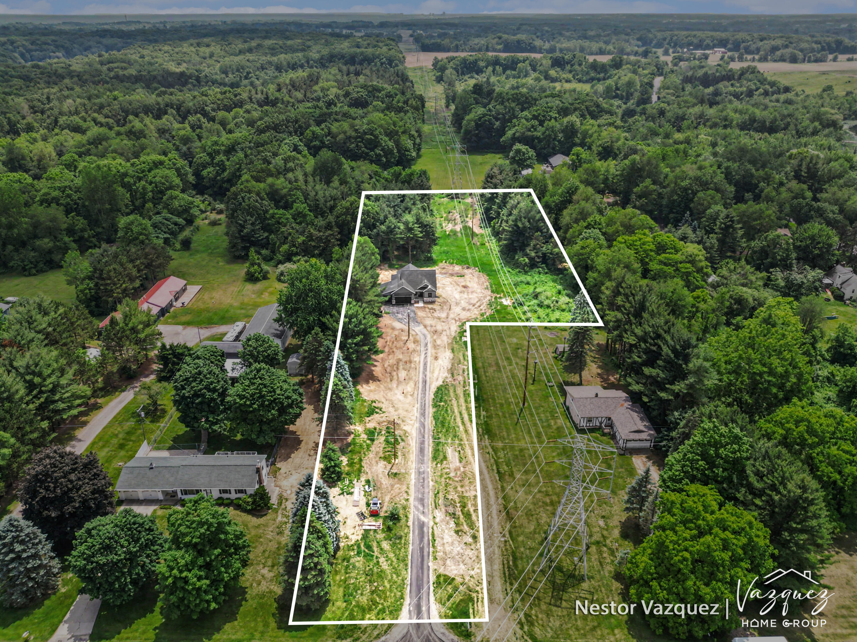 186 9 Mile Road Northeast Comstock Park, MI 49321 - Photo 2 of 40 DJI_0622-lotline