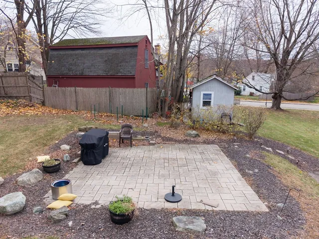 a view of a yard with table and chairs