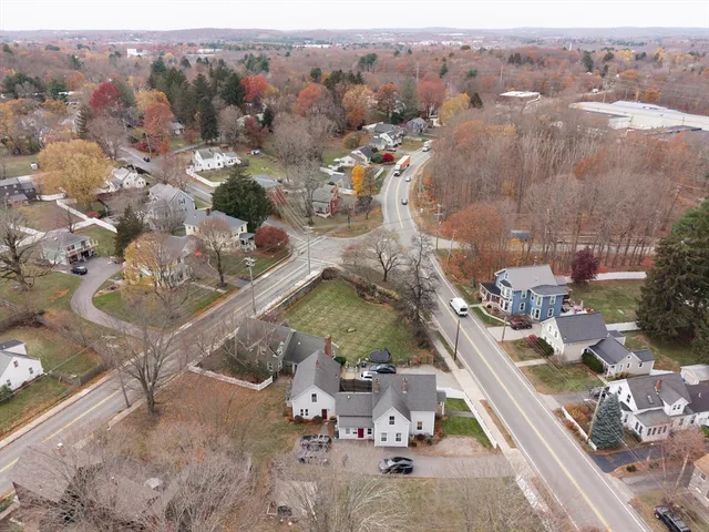 an aerial view of a house with outdoor space