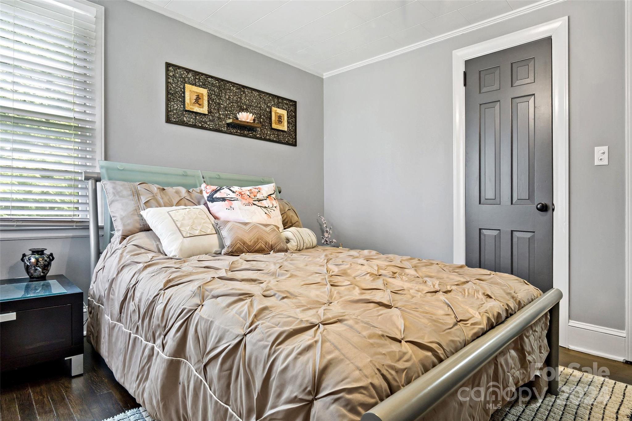 1798 Hopewell Road Morganton, NC 28655 - Photo 21 of 45 a large bed sitting in a bedroom next to a window