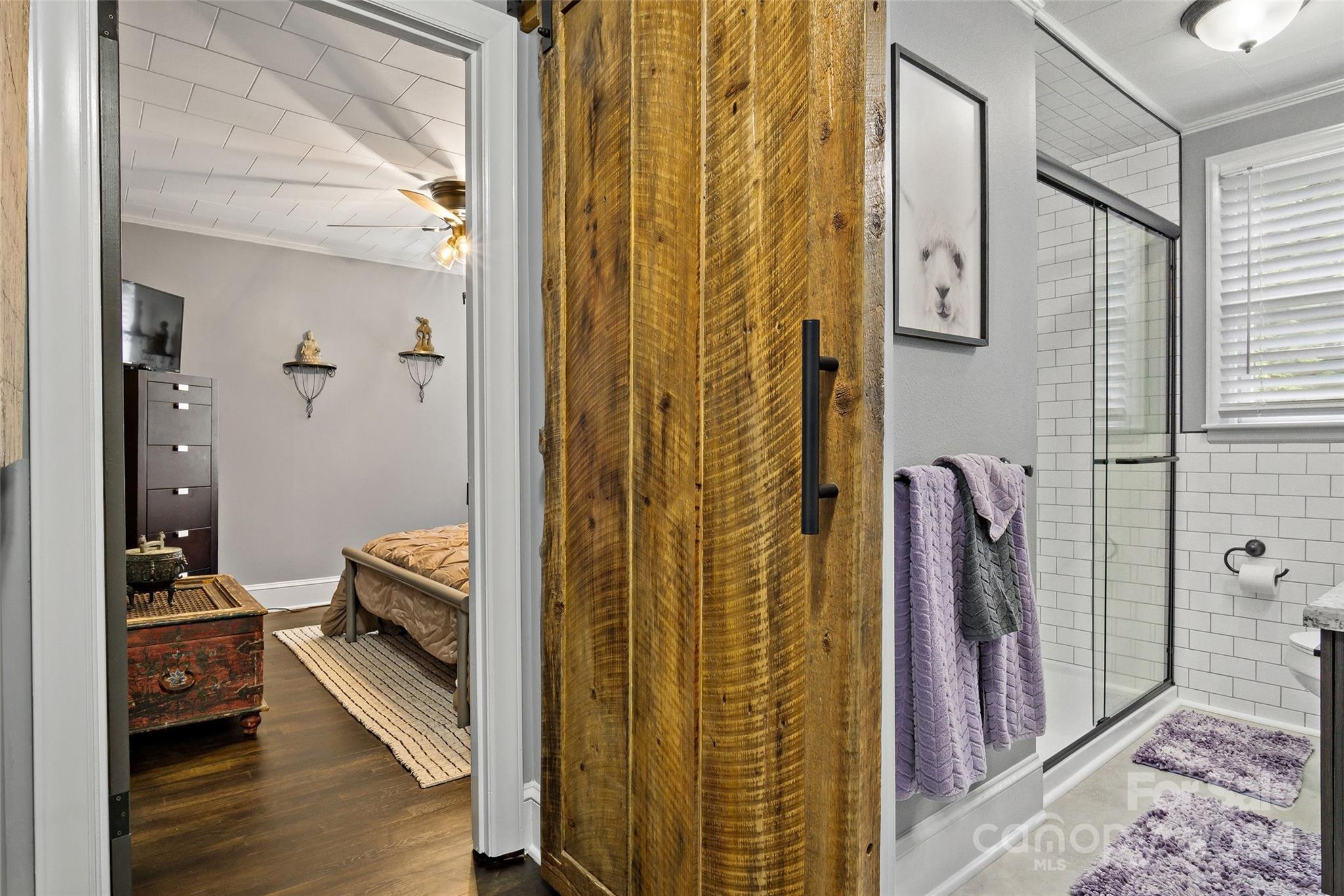 1798 Hopewell Road Morganton, NC 28655 - Photo 23 of 45 walk in closet with wooden floor