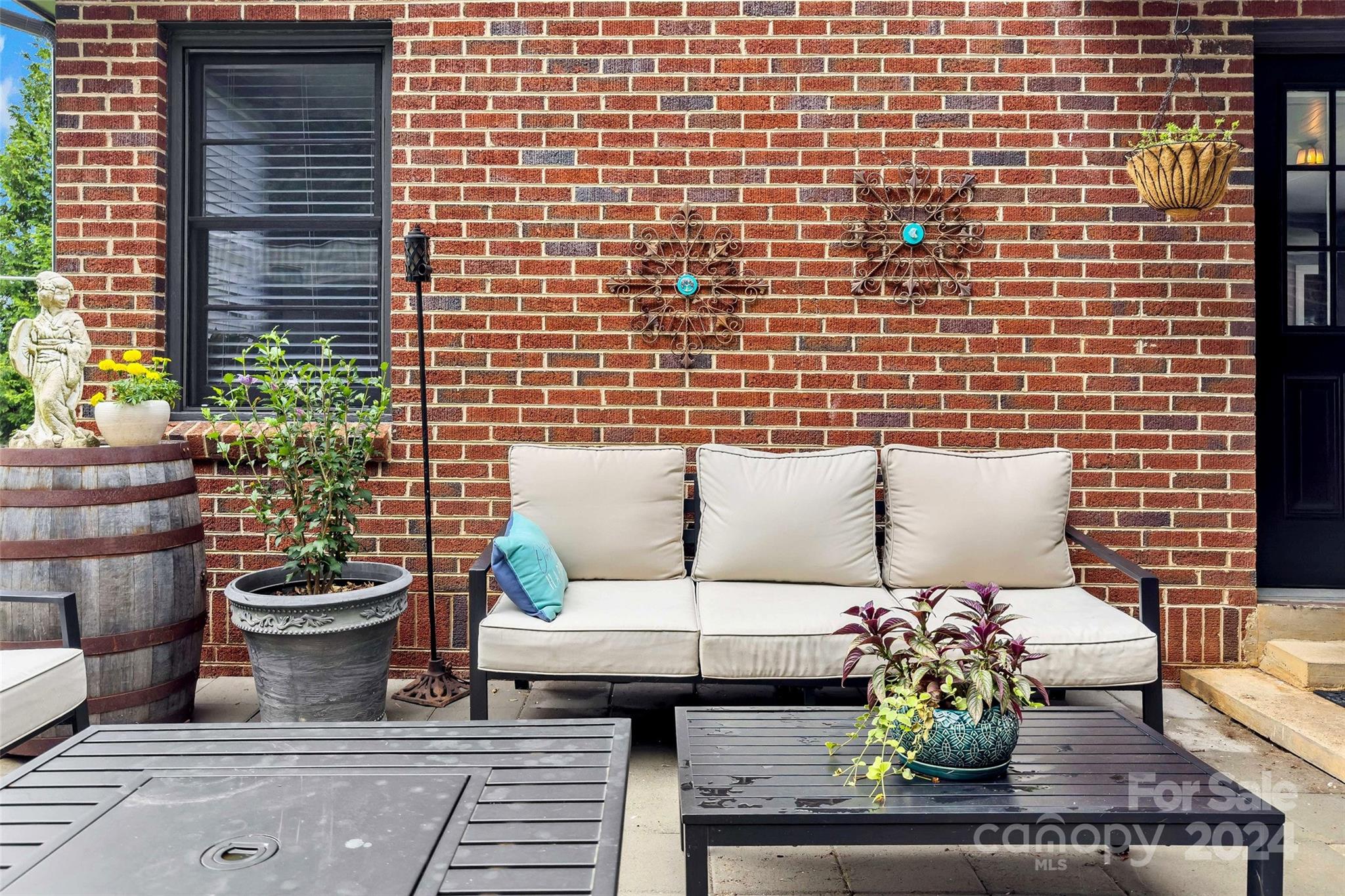 1798 Hopewell Road Morganton, NC 28655 - Photo 40 of 45 a outdoor living space with furniture and a potted plant