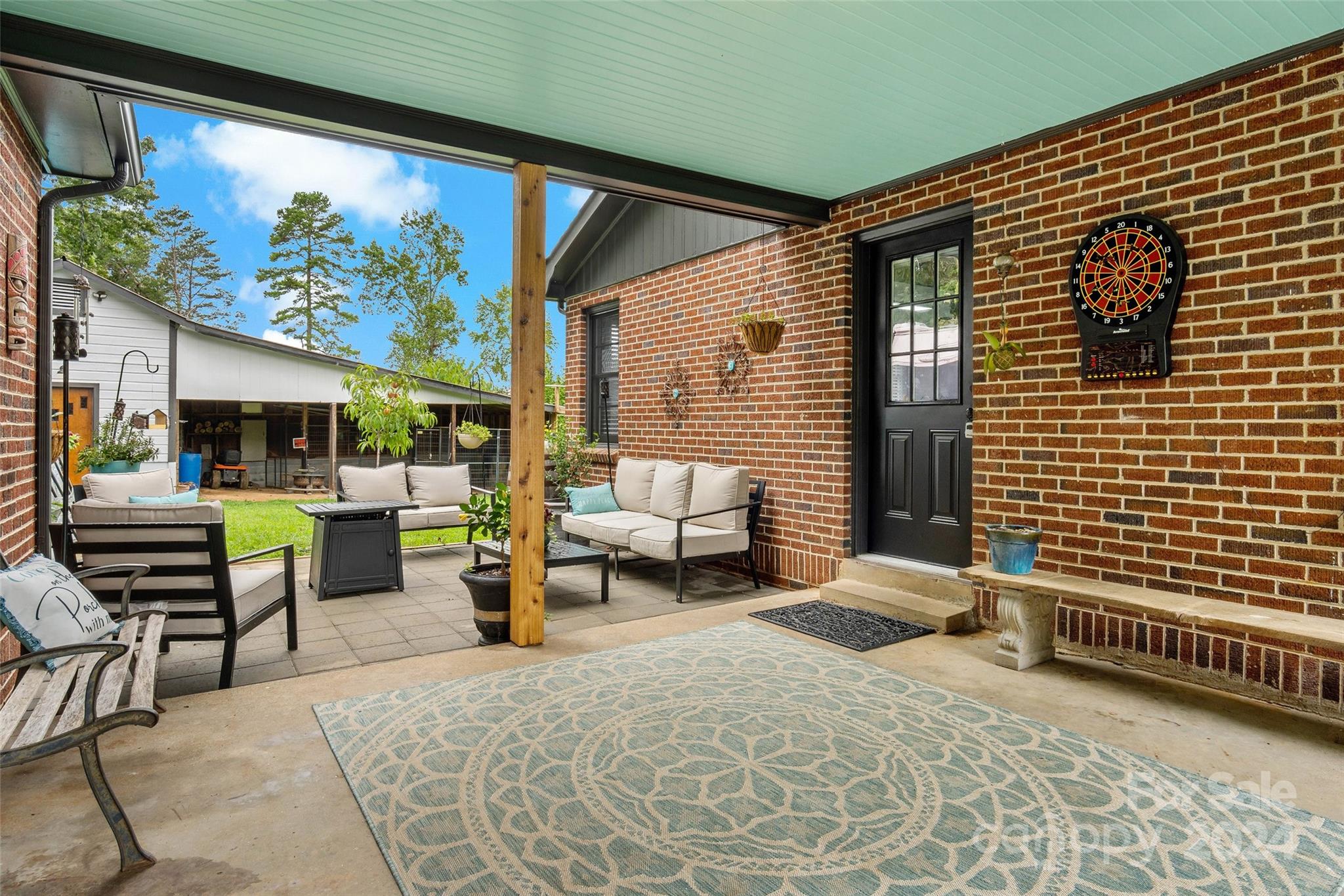 1798 Hopewell Road Morganton, NC 28655 - Photo 4 of 45 a backyard of a house with sofas