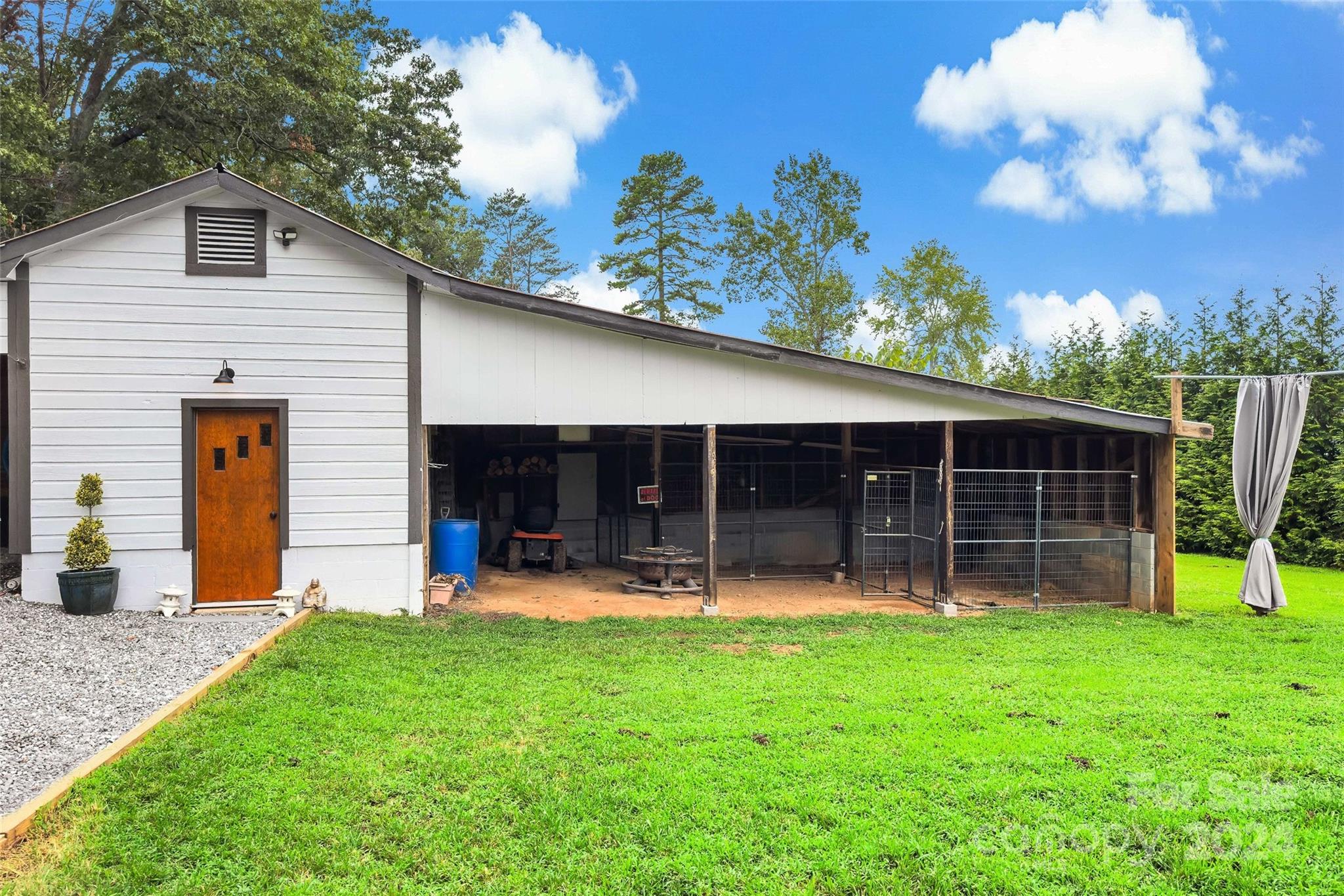 1798 Hopewell Road Morganton, NC 28655 - Photo 41 of 45 a front view of a house with a yard and porch