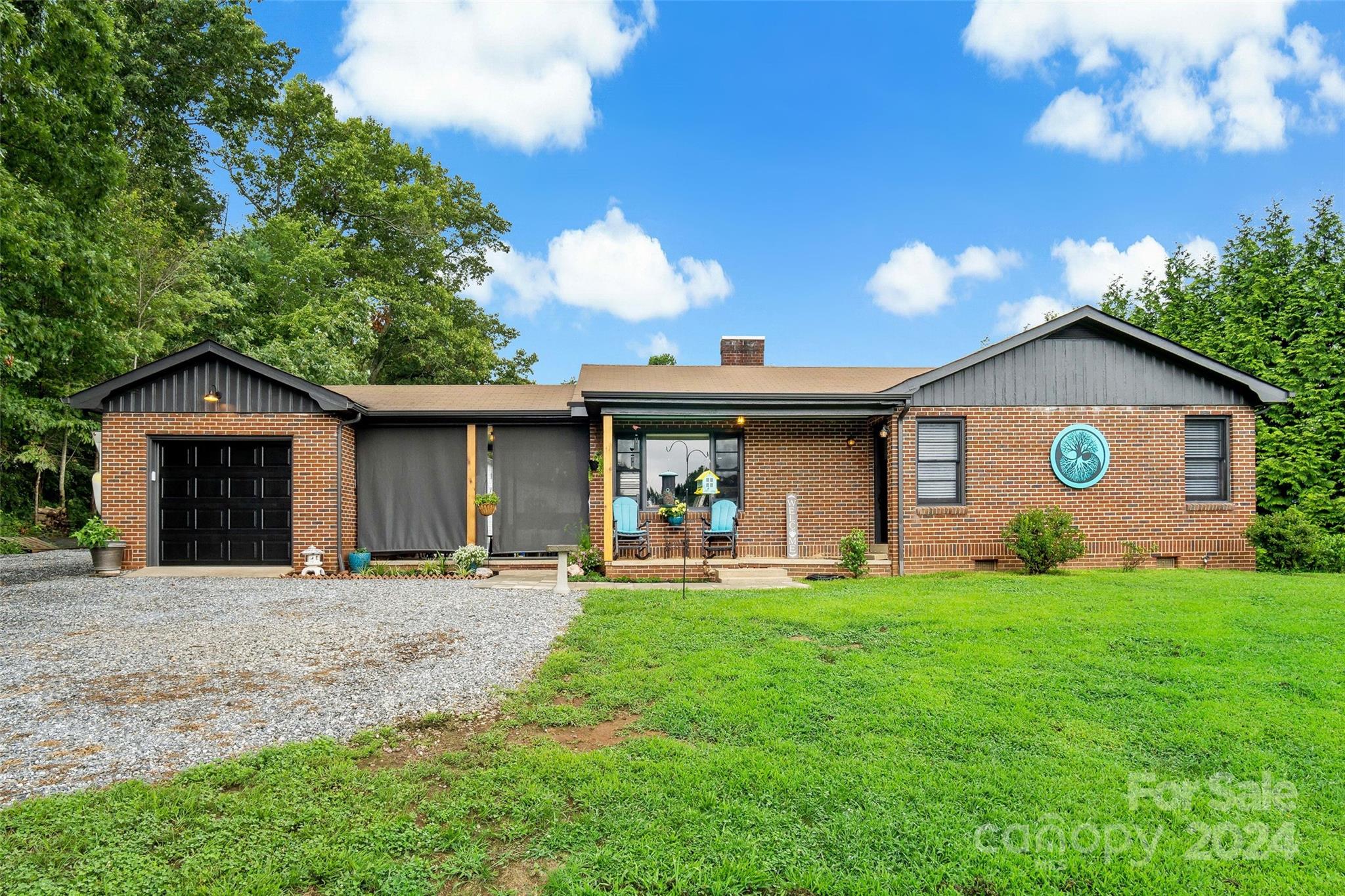 1798 Hopewell Road Morganton, NC 28655 - Photo 45 of 45 a front view of a house with a yard and garage