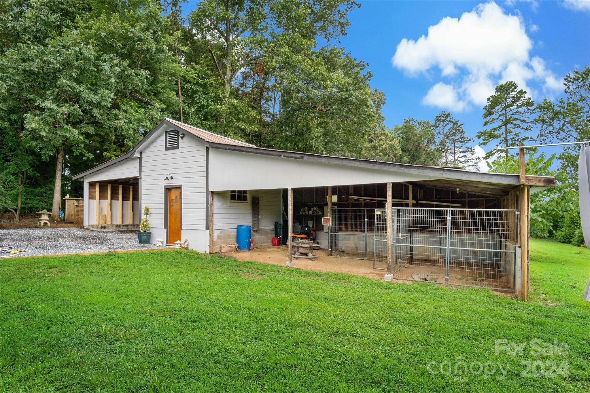 1798 Hopewell Road Morganton, NC 28655 - Photo 5 of 45 a front view of a house with a yard and trees