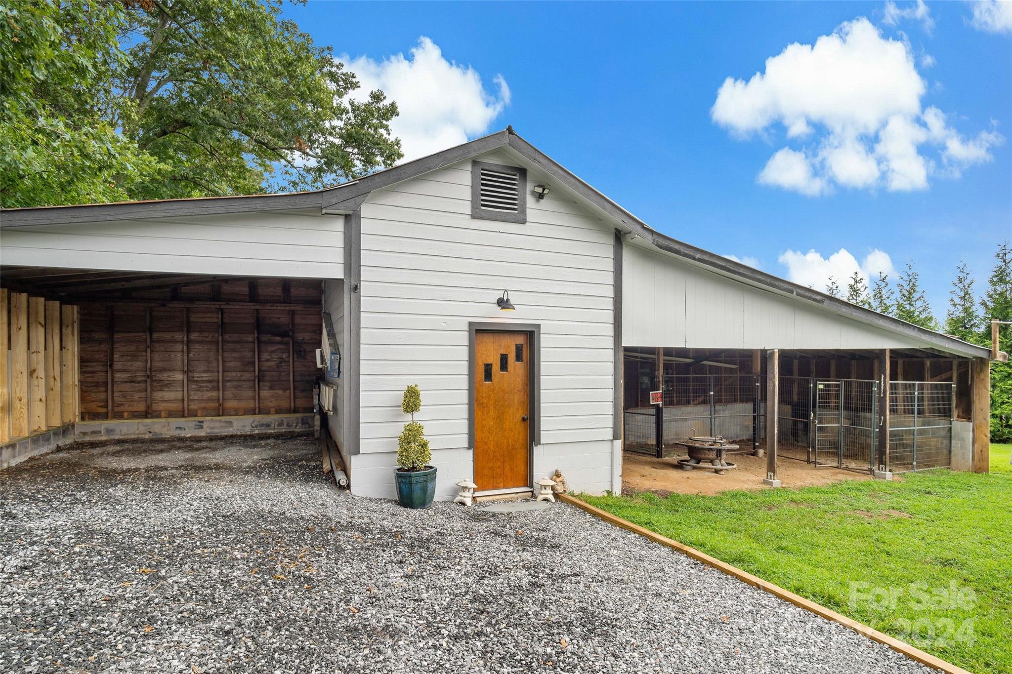 1798 Hopewell Road Morganton, NC 28655 - Photo 6 of 45 a front view of a house with garden
