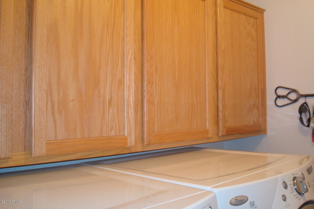 3255 East Warbler Road Gilbert, AZ 85297 - Photo 24 of 28 Interior Laundry with Cabinets
