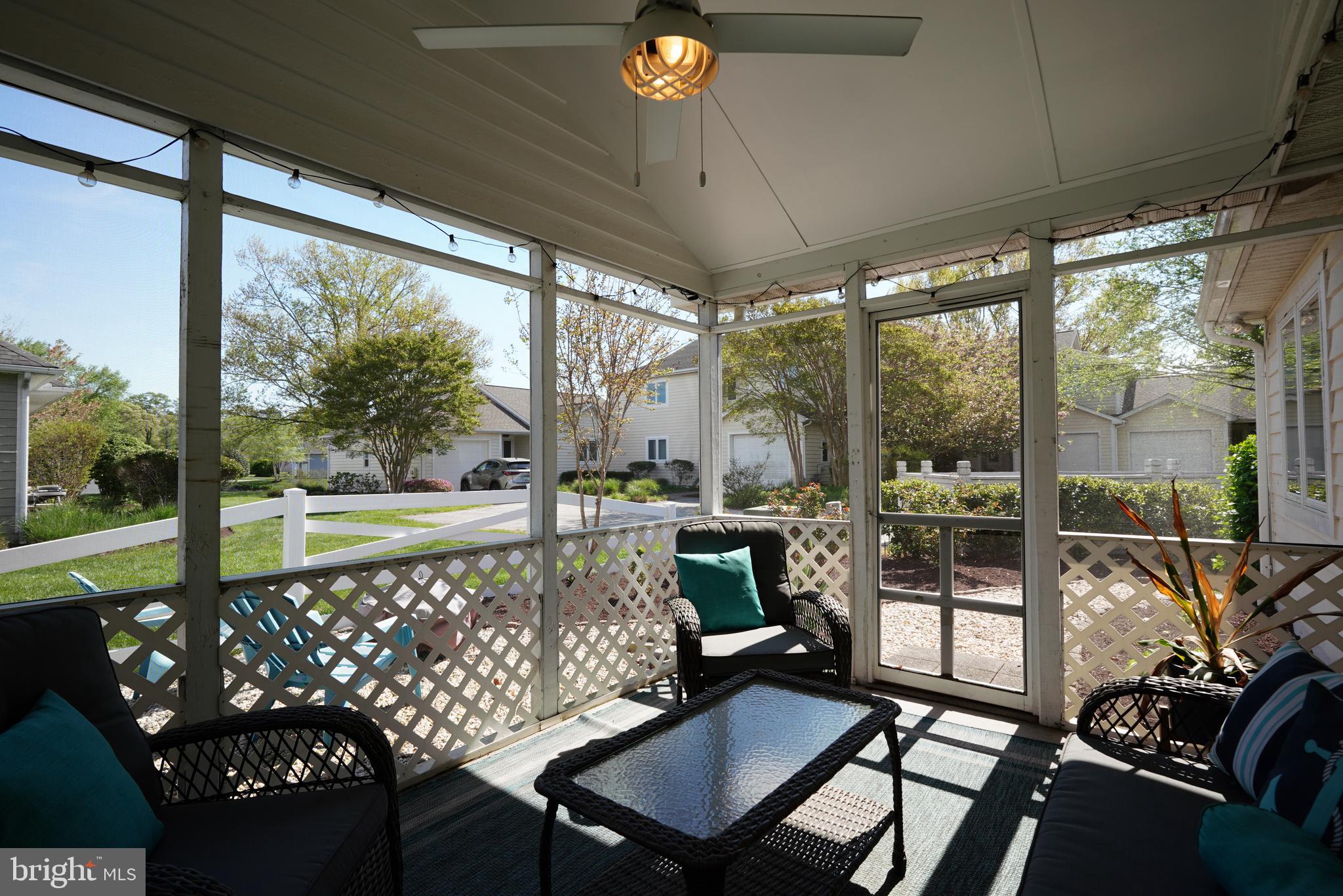112 Lakeside Drive Lewes, DE 19958 - Photo 20 of 31 a view of a chairs and table in the patio