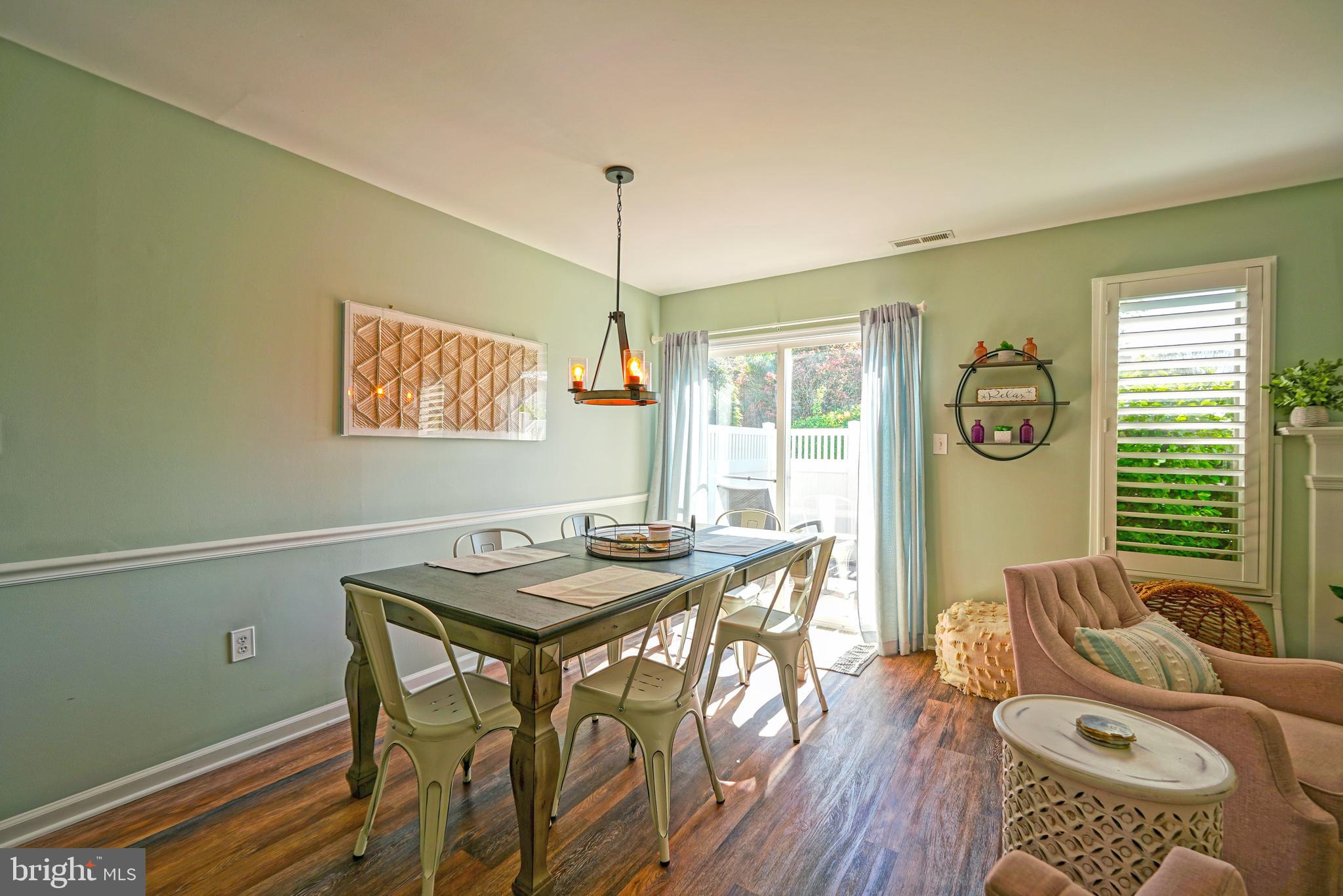 112 Lakeside Drive Lewes, DE 19958 - Photo 8 of 31 a view of a dining room with furniture window and outside view