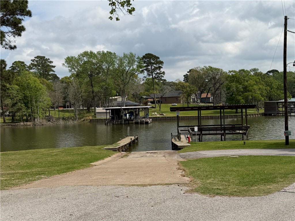 Tbd Tbd Wharf Drive Trinity, TX 75862 - Photo 3 of 8 a view of a lake with houses in the back
