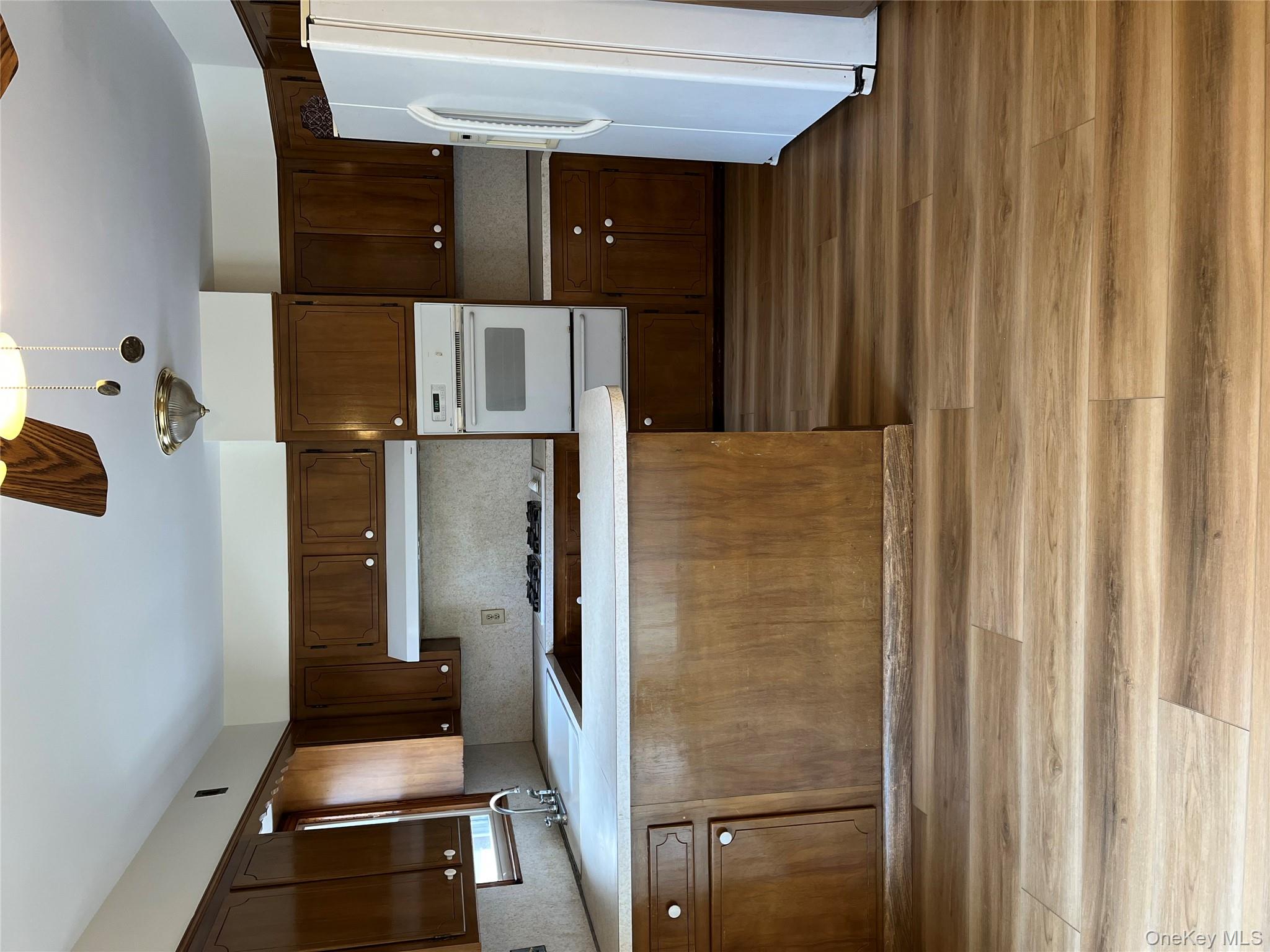 72 Bowman Avenue Rye Brook, NY 10573 - Photo 5 of 18 Large eat in kitchen with ceiling fan.