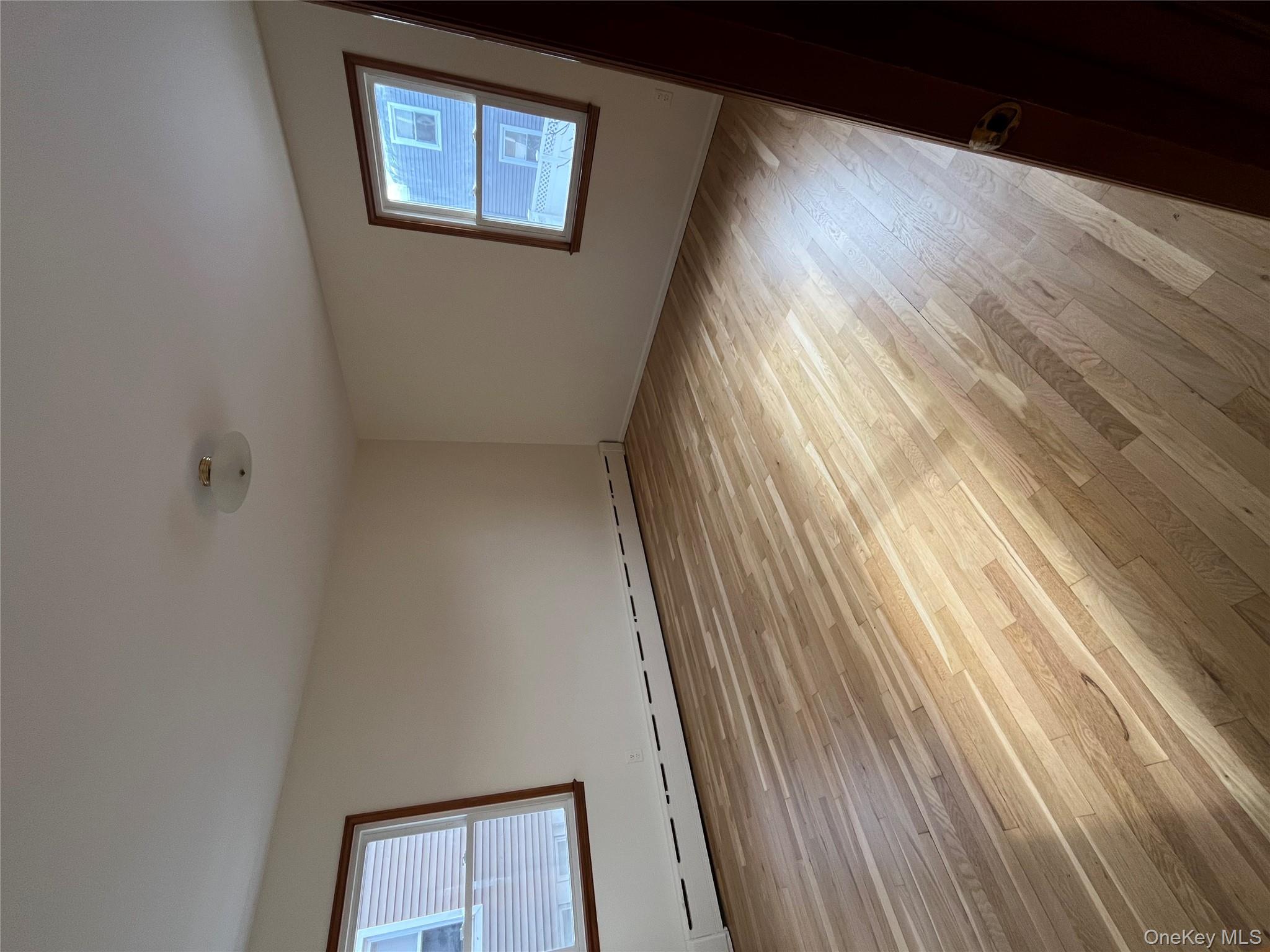 72 Bowman Avenue Rye Brook, NY 10573 - Photo 8 of 18 Oversized master bedroom with two windows.