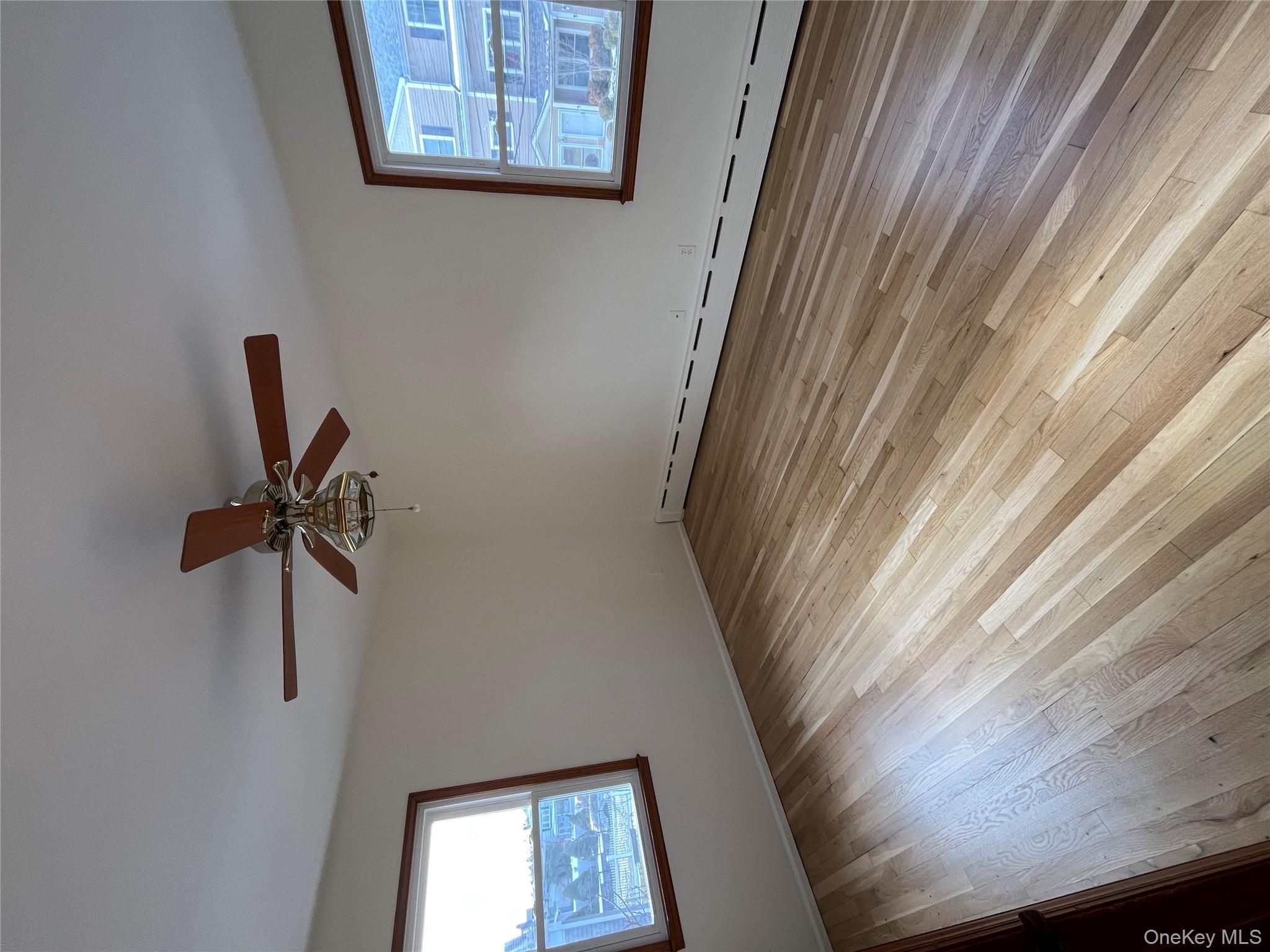 72 Bowman Avenue Rye Brook, NY 10573 - Photo 10 of 18 Bedroom #2 with two windows and ceiling fan.