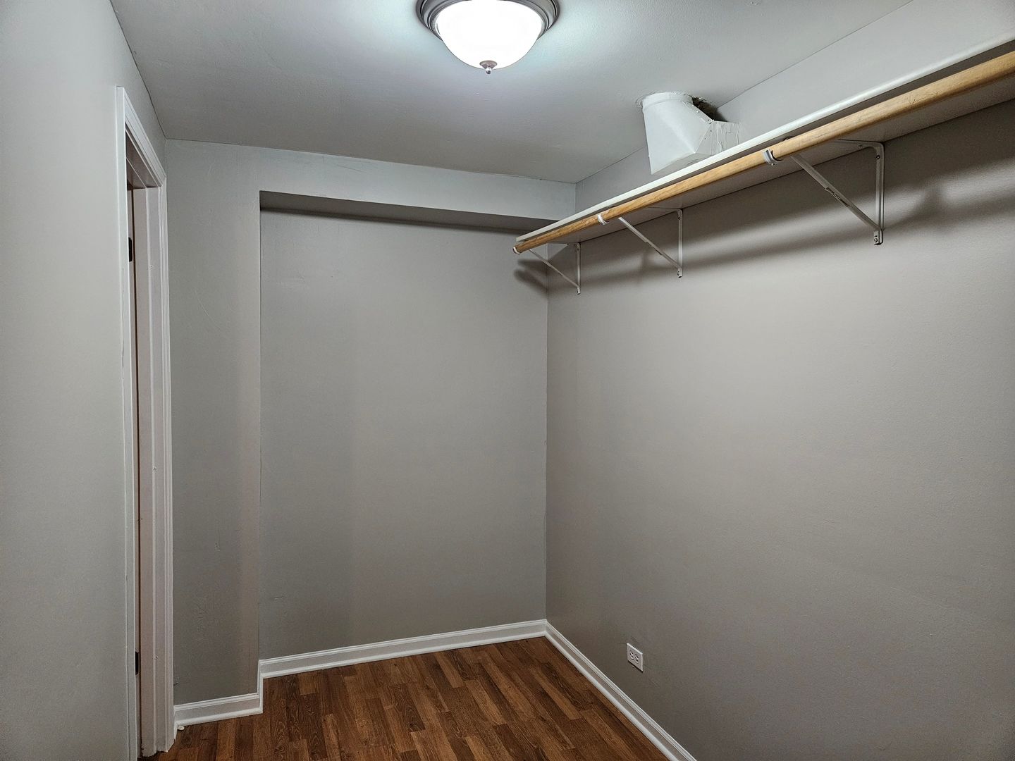 4012 North Sheridan Road, Unit GN Chicago, IL 60613 - Photo 8 of 13 a view of walk in closet with empty racks