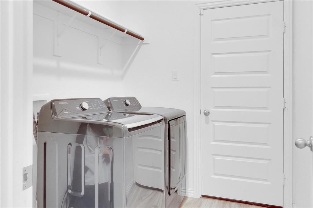 1446 Whitewater Drive Little Elm, TX 75068 - Photo 12 of 35 a view of a bathroom with a sink