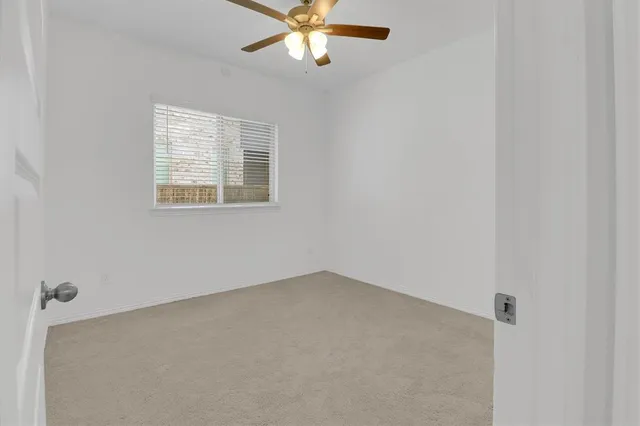 a kitchen with stainless steel appliances granite countertop a stove a sink dishwasher a refrigerator and a oven with wooden floor