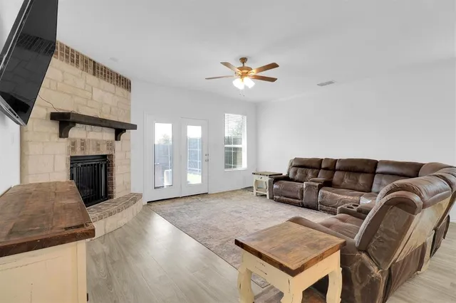 a view of livingroom with furniture and fireplace