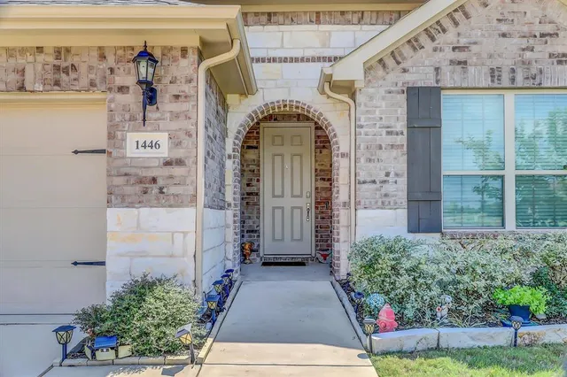 a view of entrance gate of the house