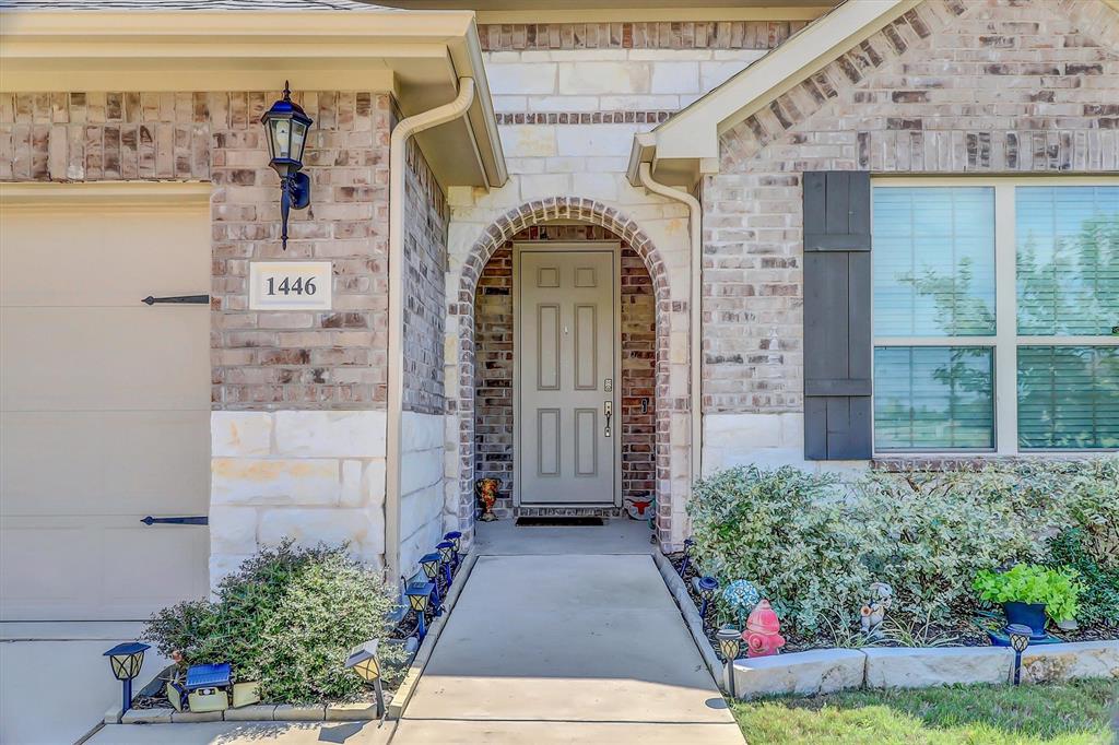 1446 Whitewater Drive Little Elm, TX 75068 - Photo 4 of 35 a view of entrance gate of the house