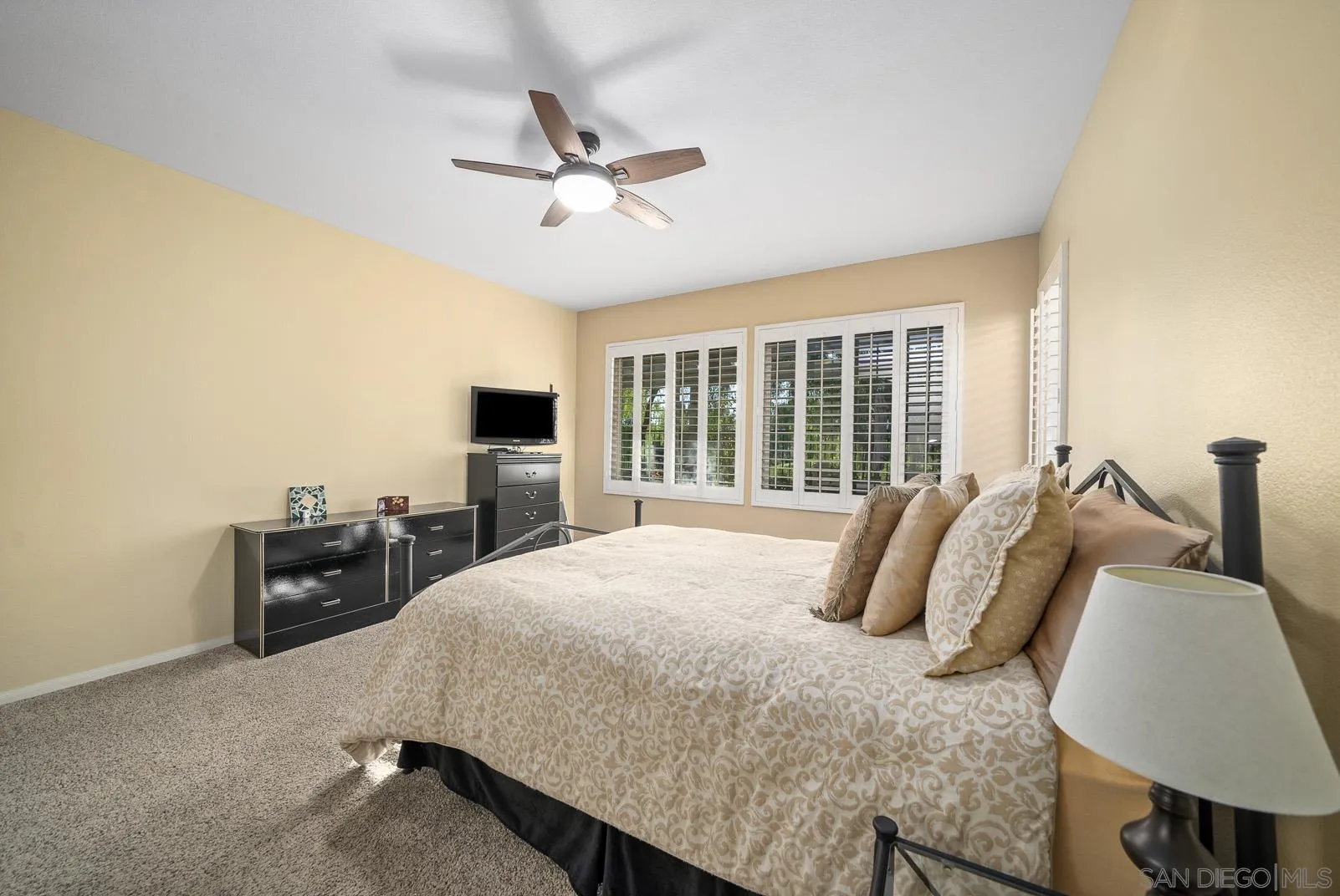 41453 Temeku Drive Temecula, CA 92591 - Photo 16 of 34 a bedroom with a bed and tv