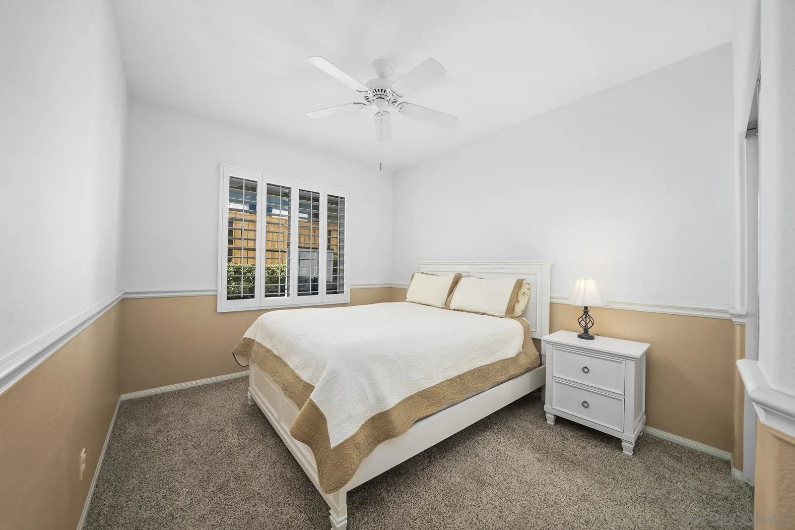 41453 Temeku Drive Temecula, CA 92591 - Photo 20 of 34 a bedroom with a bed and a window