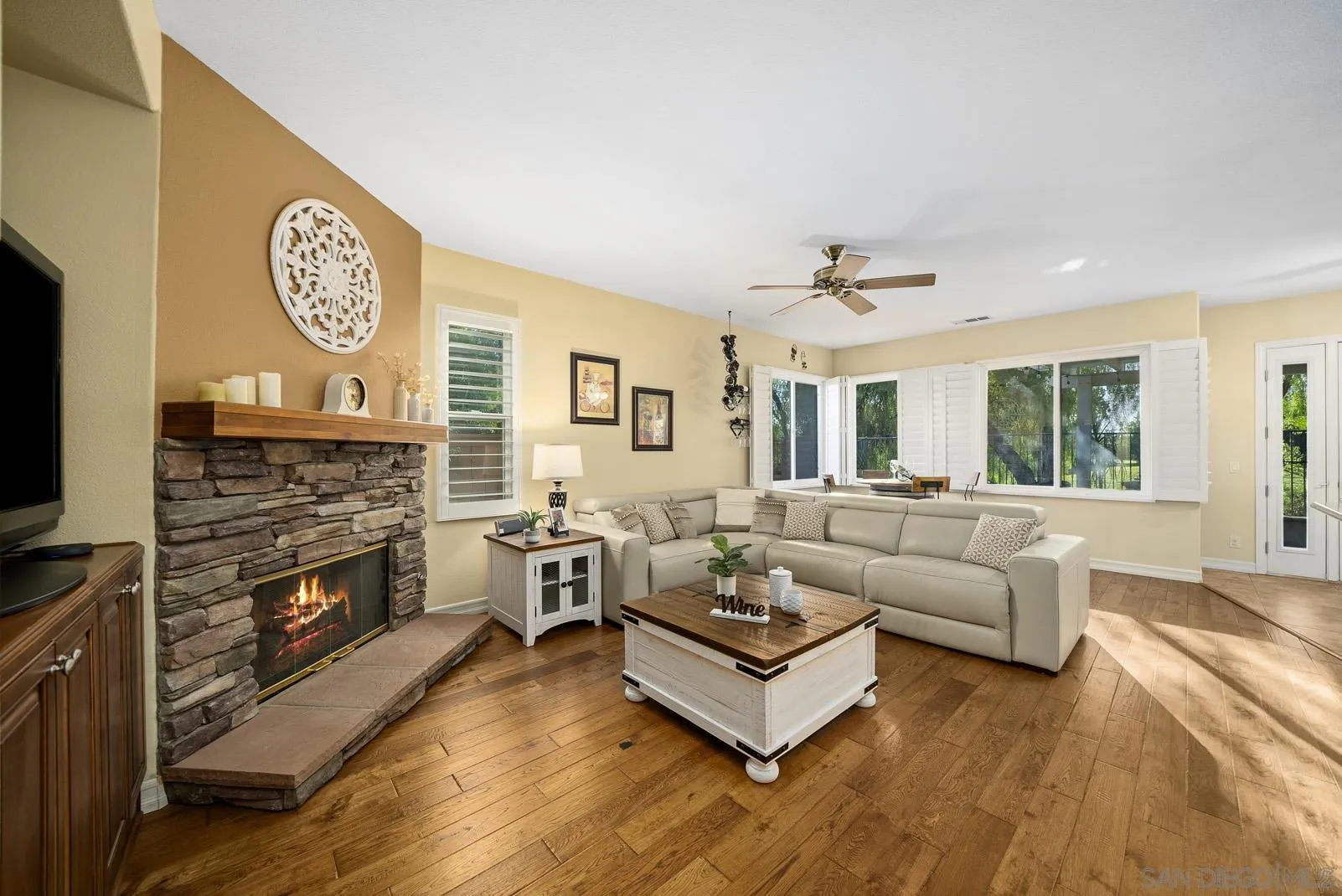 41453 Temeku Drive Temecula, CA 92591 - Photo 2 of 34 a living room with furniture and a fireplace