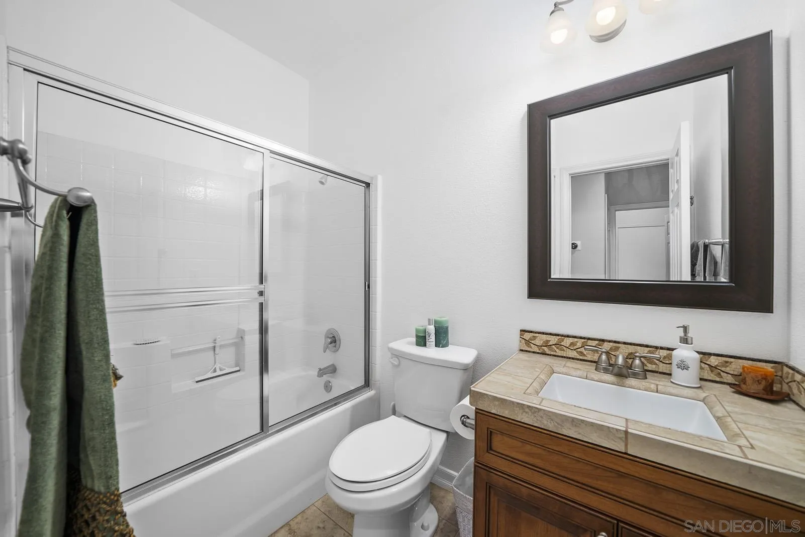 41453 Temeku Drive Temecula, CA 92591 - Photo 21 of 34 a white toilet sitting next to a bathroom sink