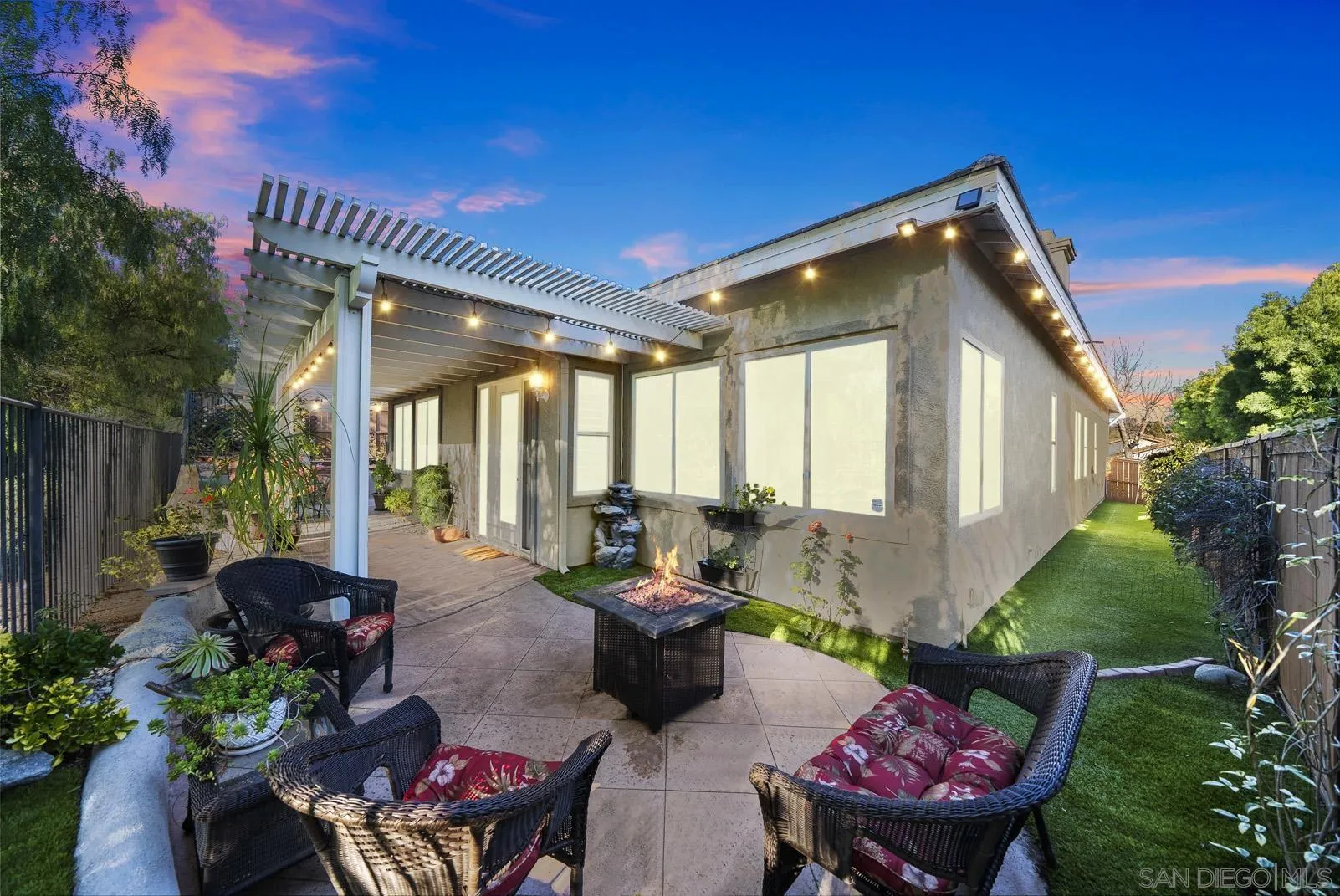 41453 Temeku Drive Temecula, CA 92591 - Photo 24 of 34 a view of a patio with couches table and chairs and potted plants