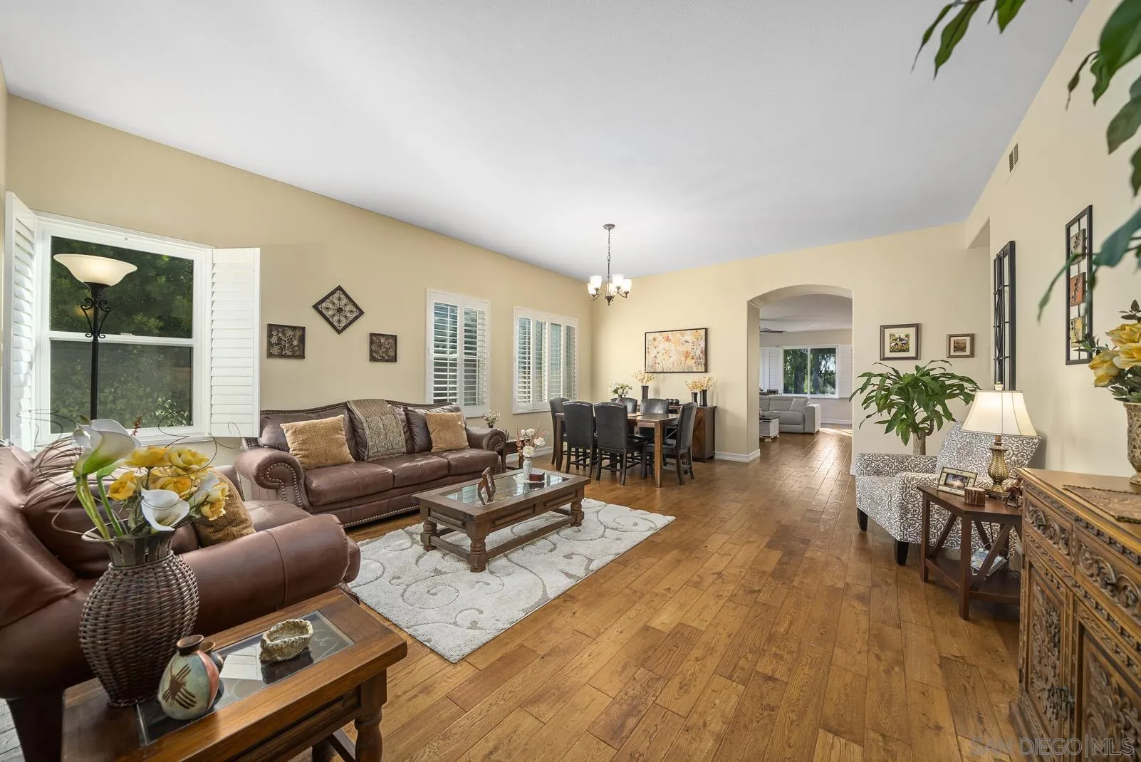 41453 Temeku Drive Temecula, CA 92591 - Photo 4 of 34 a living room with furniture and wooden floor