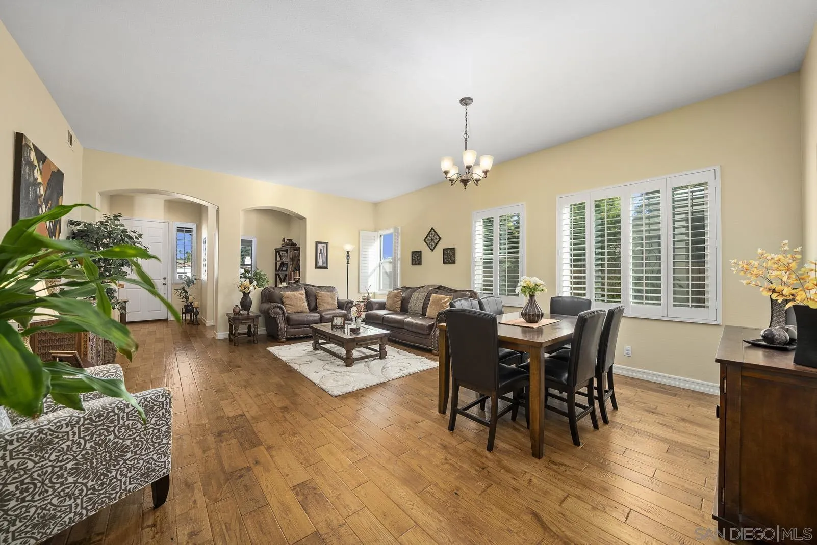 41453 Temeku Drive Temecula, CA 92591 - Photo 5 of 34 a view of a dining room with furniture window and wooden floor