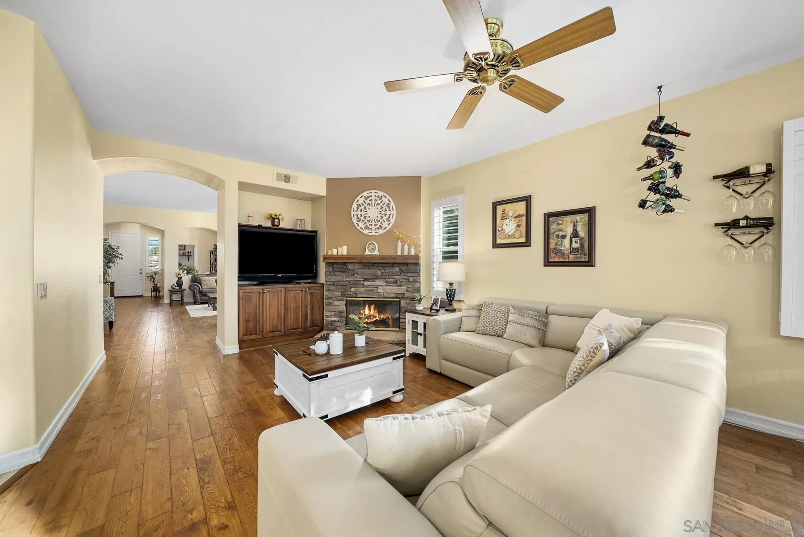 41453 Temeku Drive Temecula, CA 92591 - Photo 6 of 34 a living room with furniture and a flat screen tv
