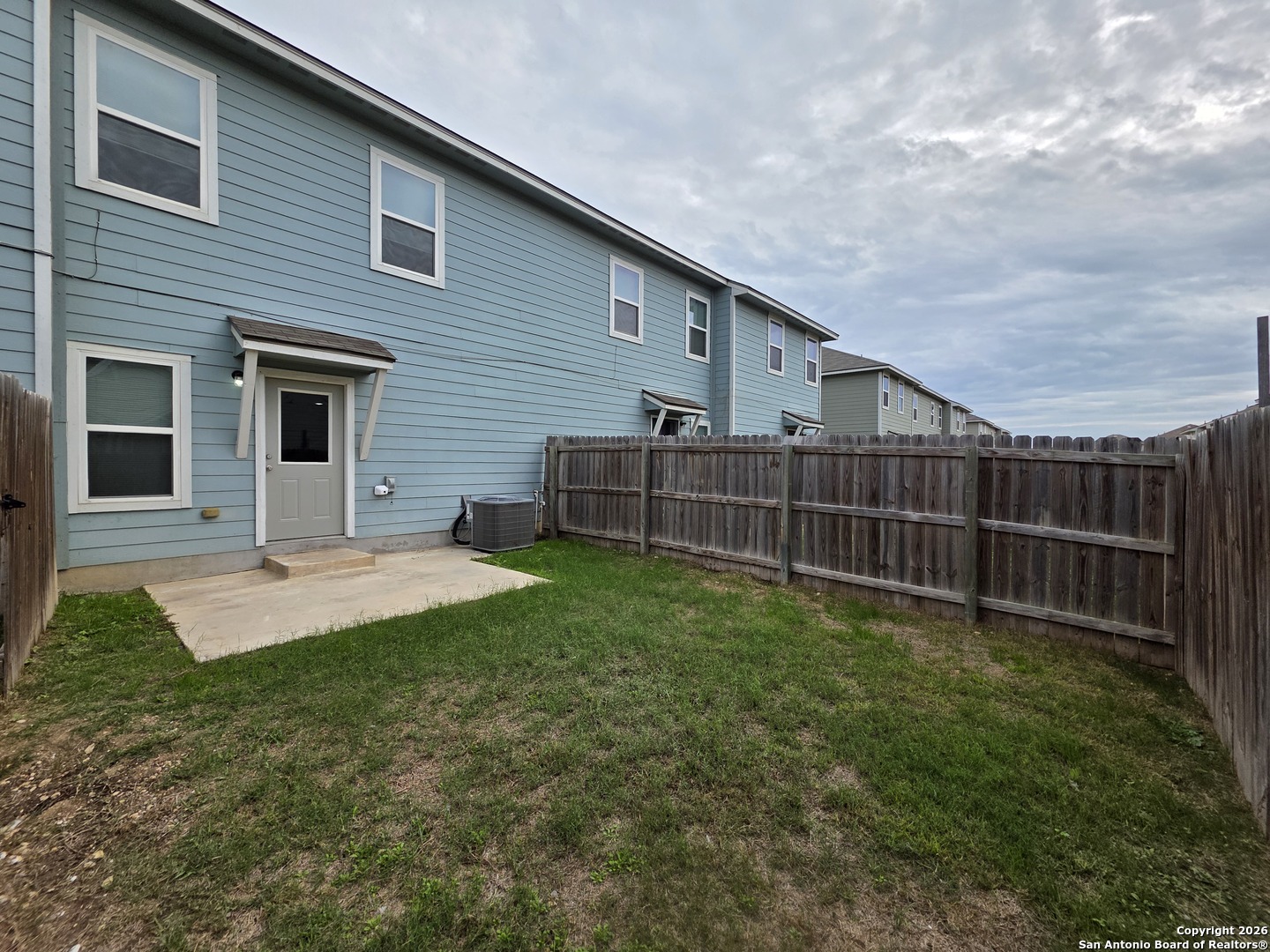 16909 Dancing Ava, Unit 2 Selma, TX 78154 - Photo 21 of 22 a view of a backyard with a garden